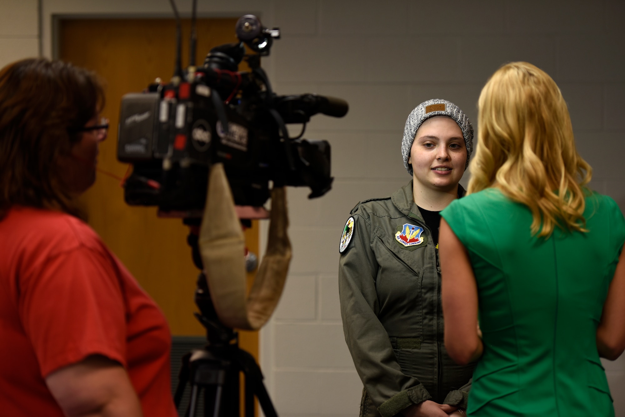 A local television crew interviews honorary 2nd Lt. Ashleigh Hunt during the Pilot for a Day event May 26, 2016 at the 180th Fighter Wing in Swanton, Ohio. The Pilot for a Day program is a way for the 180FW to support the local community by providing a fun-filled day for children and young adults living with chronic or life-threatening disease or illness. (U.S. Air National Guard photo by Staff Sgt. Shane Hughes)