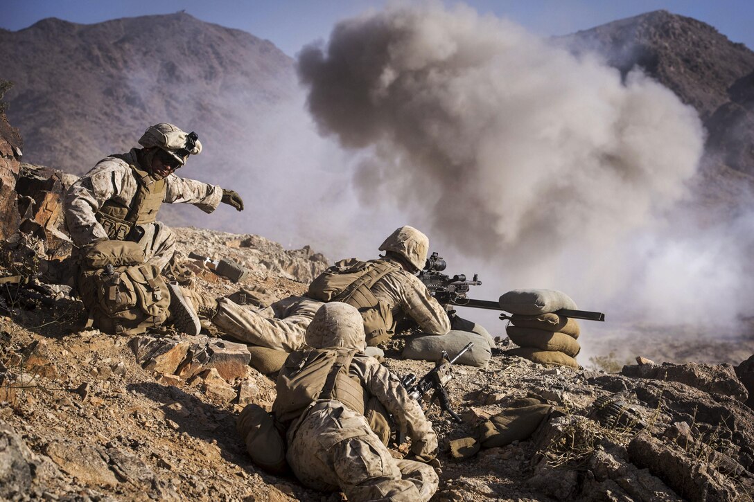 Marines and sailors conduct a training attack on range 400 at Marine Corps Air Ground Combat Center Twentynine Palms, Calif., May 25, 2016. Marines use the complex range to test and improve combat readiness and skills. Navy photo by Petty Officer 1st Class Nathan Laird