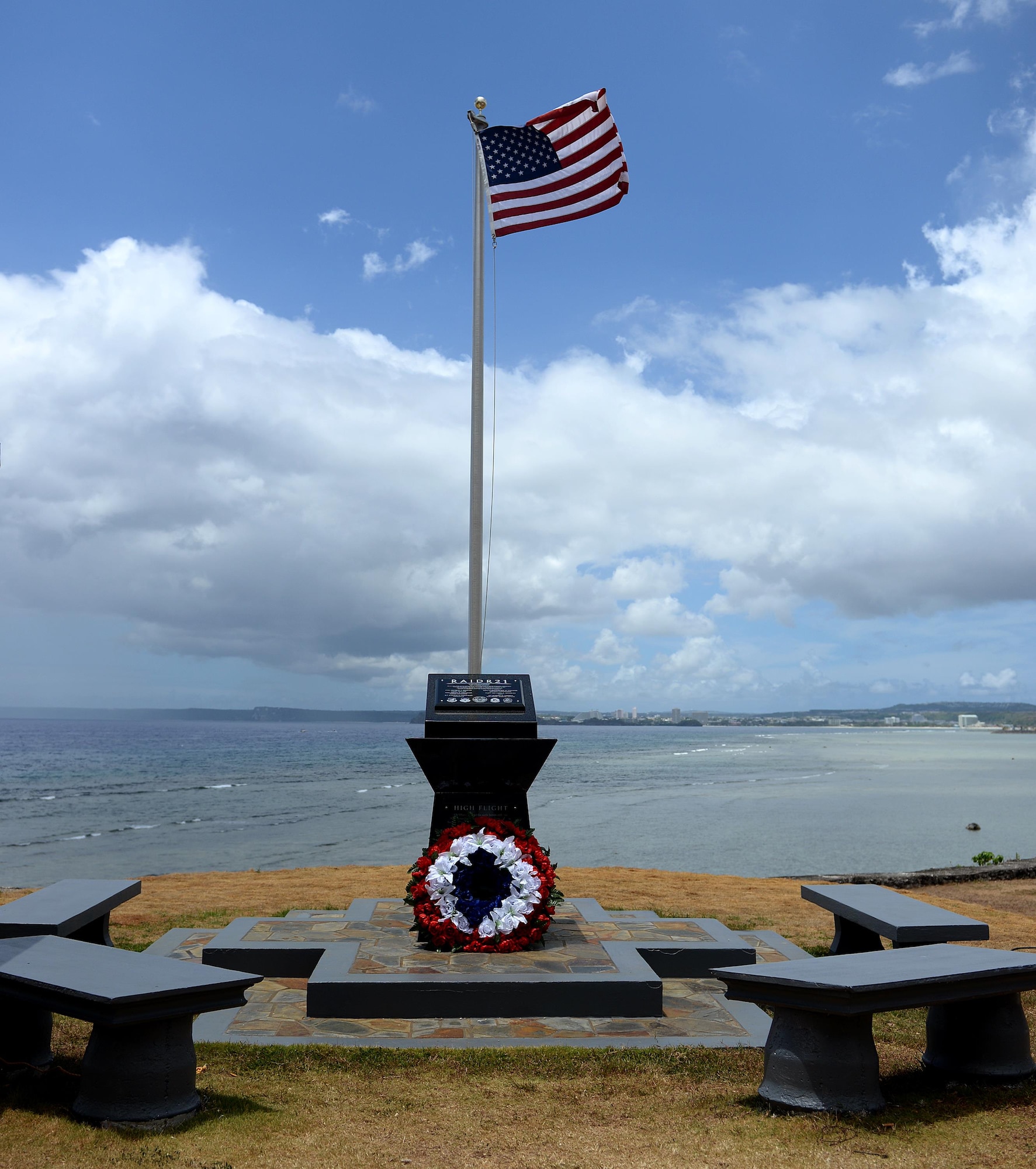 The RAIDR 21 monument, located in Adelup, Guam, honors six B-52 Stratofortress aviators who lost their lives during a training mission and were slated to perform a flyover in support of Guam’s Liberation Day July 21, 2008. The monument received modifications from Alex Wood, a boy scout, who constructed a retaining wall around the monument, painted the surrounding area and cleaned the monument. (U.S. Air Force photo by Staff Sgt. Benjamin Gonsier)