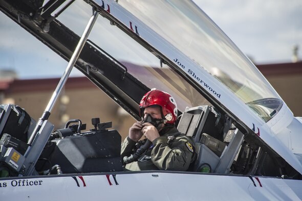 Joe Sherwood, Good Morning Lubbock news reporter, prepares for a media flight with U.S. Air Force Thunderbird #7 in preparation for the 2016 Air Commandos on the High Plains air show May 26, 2016, at Cannon Air Force Base, N.M. The 2016 Cannon Air Show is an opportunity to celebrate the long-standing relationship between the 27th Special Operations Wing and the High Plains community. (U.S. Air Force photo/Senior Airman Shelby Kay-Fantozzi)