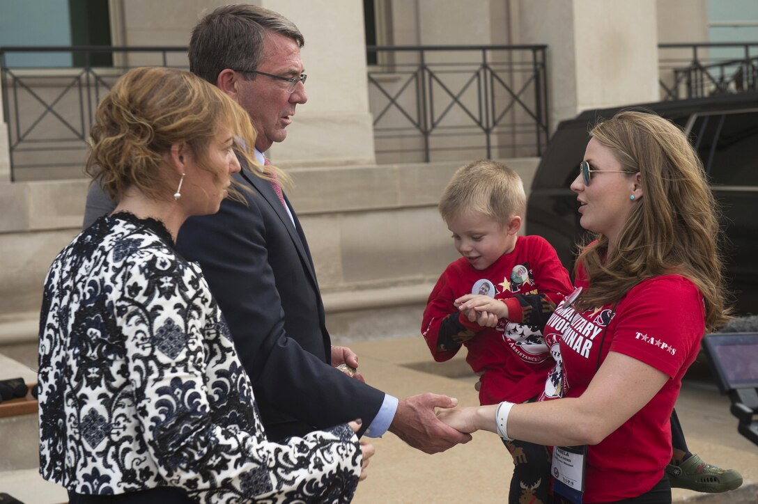 Defense Secretary Ash Carter and his wife, Stephanie, greet people arriving at the Pentagon as part of a seminar and youth camp held annually by the Tragedy Assistance Program for Survivors, or TAPS, May 27, 2016. TAPS supports families who have lost a military member. DoD photo by Senior Master Sgt. Adrian Cadiz