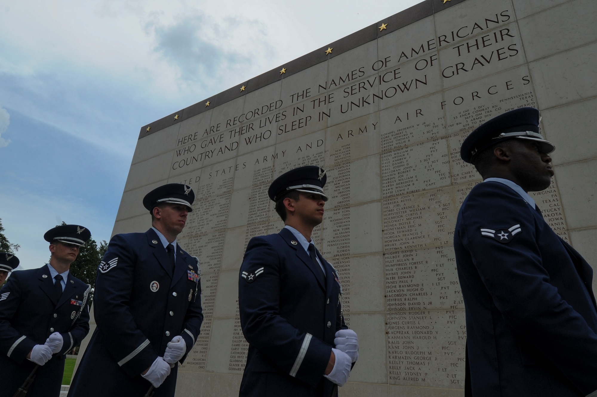 A U.S. Air Force Honor Guard detail from Spangdahlem Air Base, Germany, stands ready to be called to conduct a ceremonial volley as part of a Memorial Day ceremony at the Luxembourg American Cemetery and Memorial in Luxembourg, May 28, 2016. The holiday serves as an opportunity to pause and remember the sacrifices of more than one million Soldiers, Sailors, Airmen, Marines and Coast Guardsmen who gave their lives in defense of freedom.  (U.S. Air Force photo by Staff Sgt. Joe W. McFadden/Released)  