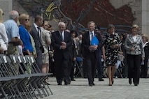 (From center left to right) Lucien Weiler, marshall of the Luxembourg Court, David McKean, U.S. Ambassador to Luxembourg, Lydie Polfer, mayor of Luxembourg city, and Simone Beissel, vice president of the Luxembourg Chamber of Deputies, walk to their seats as members of the official party during a Memorial Day ceremony at the Luxembourg American Cemetery and Memorial in Luxembourg, May 28, 2016. More than 200 Luxembourgers and Americans gathered at the cemetery to reflect on the sacrifices made by fallen U.S. service members.  (U.S. Air Force photo by Staff Sgt. Joe W. McFadden/Released)  