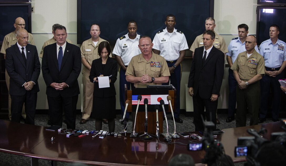 Lt. Gen. Lawrence D. Nicholson announces a 30-day period of unity and mourning for all U.S. military and Status of Forces Agreement personnel on Okinawa, at a press conference on Camp Foster, Okinawa, Japan, May 28, 2016. Out of respect for the people of Okinawa, Nicholson chose to demonstrate the solidarity of the U.S. service members here and the people of Okinawa by honoring the recent loss of an Okinawan female. The period of unity and mourning was directed to all U.S. military, and Nicholson also highly encouraged all SOFA-status members to partake, as this period will serve as a time to reflect on personal conduct, to consider their roles as ambassadors to Japan, and demonstrate the deepest sympathies for the victim and her family. Nicholson, from Toronto, Canada, is the Okinawa Area Coordinator and commanding general for III Marine Expeditionary Force. (U.S. Marine Corps photo by Lance Cpl. Jessica N. Etheridge/Released)