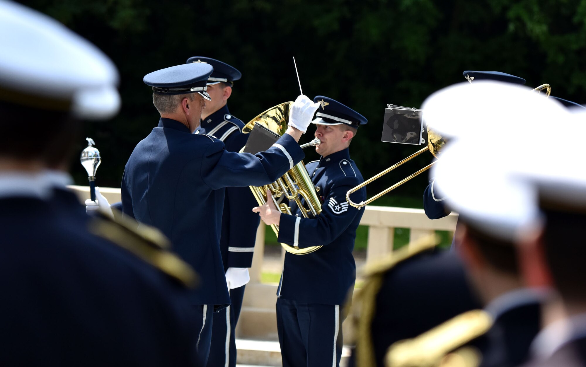 PARIS – A French ceremonial band watches, as U.S. Air Force Lt. Col. Michael Minch, U.S. Air Forces in Europe Band commander, and the USAFE Band play ceremonial music during a Memorial Day ceremony at the Lafayette Escadrille Memorial, in Marnes-la-Coquette, France, May 28, 2016. During the ceremony, French and American speakers honored the shared sacrifices of U.S. and French service members fighting for each other’s freedom and security in a relationship that began more than 240 years ago during the American Revolutionary War. (U.S. Air Force photo by Senior Master Sgt. Brian Bahret/Released) 