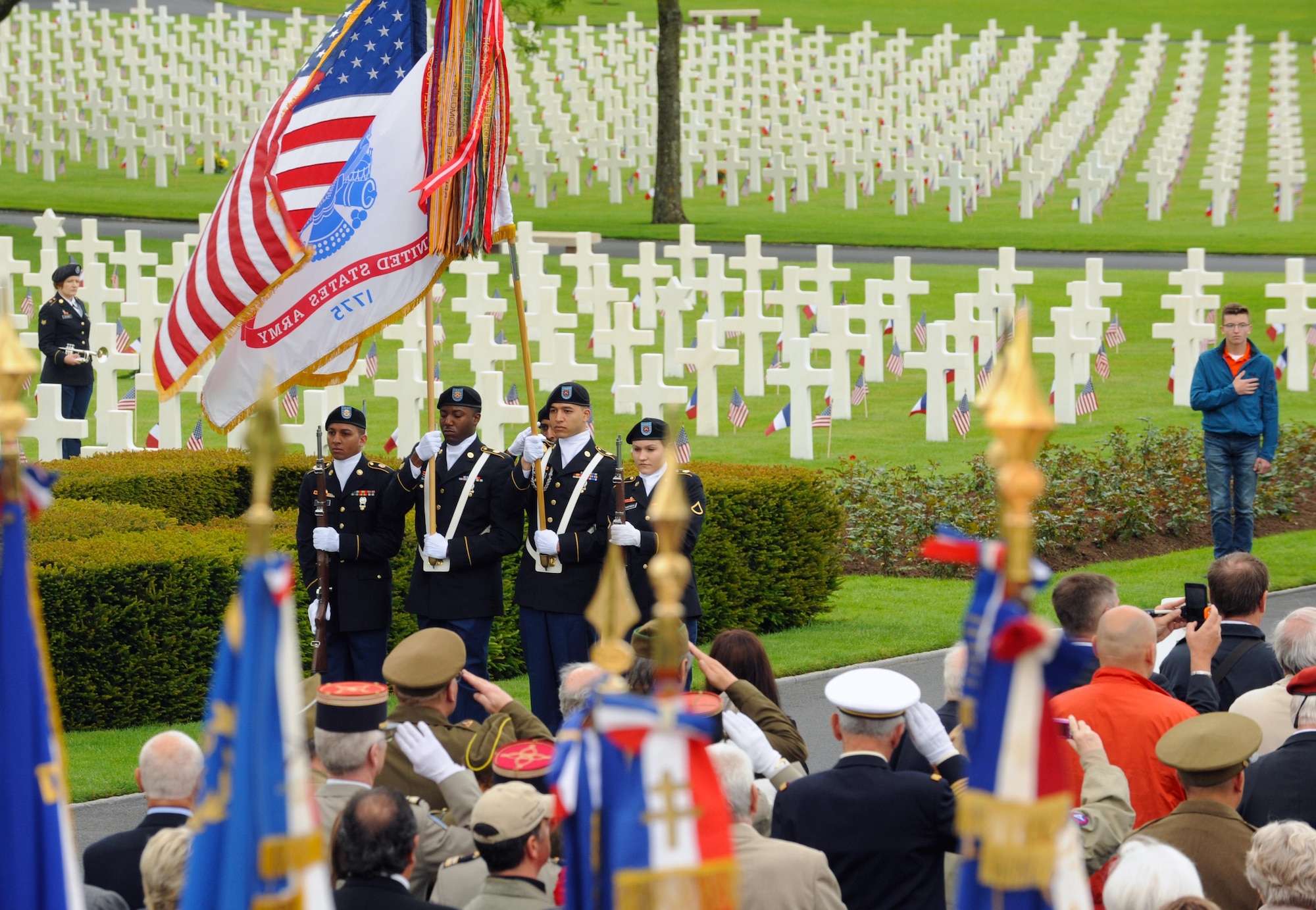 Members of the 16th Sustainment Brigade present the colors during a Memorial Day ceremony May 29, 2016, at Lorraine American Cemetery and Memorial, in St. Avold, France. Memorial Day recognizes men and women who have died while serving in the Armed Forces. (U.S. Air Force photo/Staff Sgt. Sharida Jackson)