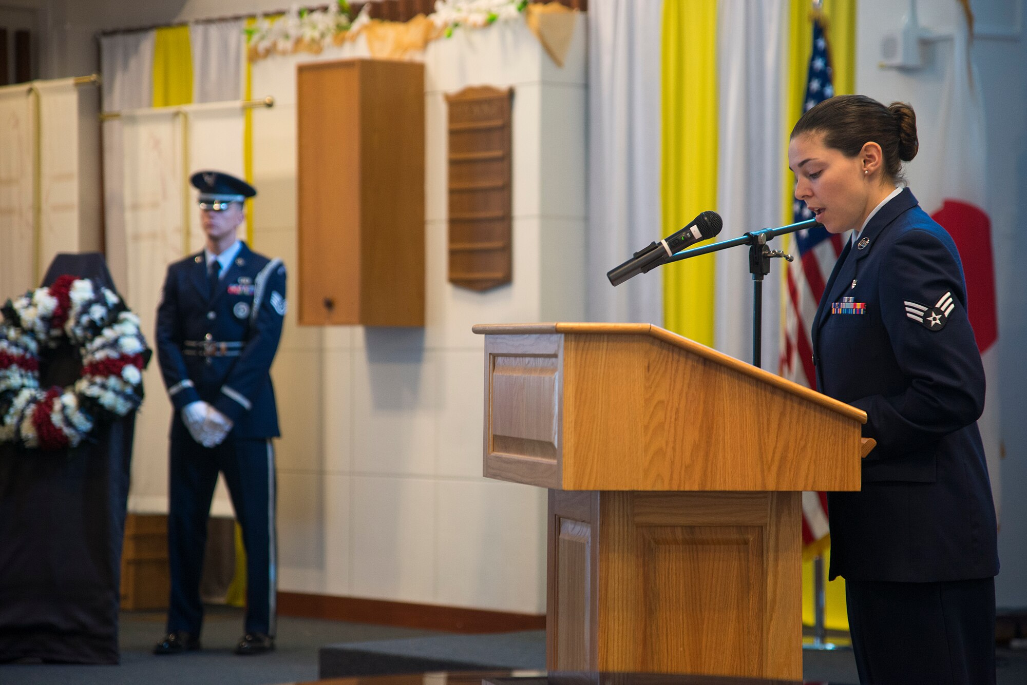 U.S. Air Force Senior Airman Kaitlyn Venegas, 18th Medical Operations Squadron mental health technician, emcees for the Memorial Day ceremony May 30, 2016 at Kadena Air Base, Japan. According to the Department of Veteran’s Affairs, there have been more than 650,000 combat deaths since the U.S. was founded. (U.S. Air Force photo by Staff Sgt. Maeson L. Elleman)