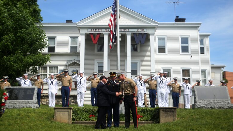 Maj. Gen. Brian Beaudreault, front right, commanding general, 2nd Marine Division, shakes hands with leaders of the Veterans of Foreign Wars detachment in the Village of Hastings-on-Hudson, after a wreath-laying ceremony meant to honor fallen veterans, May 29, 2016. This year is the 28th year New York has hosted Fleet Week. U.S. Marines and sailors are in New York to interact with the public, demonstrate capabilities and teach the people of New York about America’s sea service.