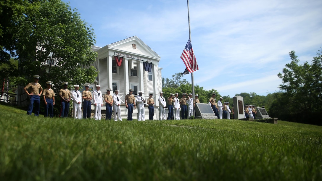Marines and sailors stand in front of the Veterans of Foreign Wars detachment in the Village of Hastings-on-Hudson prior to a wreath-laying ceremony meant to honor fallen veterans, May 29, 2016. This year is the 28th year New York has hosted Fleet Week. U.S. Marines and sailors are in New York to interact with the public, demonstrate capabilities and teach the people of New York about America’s sea service. 