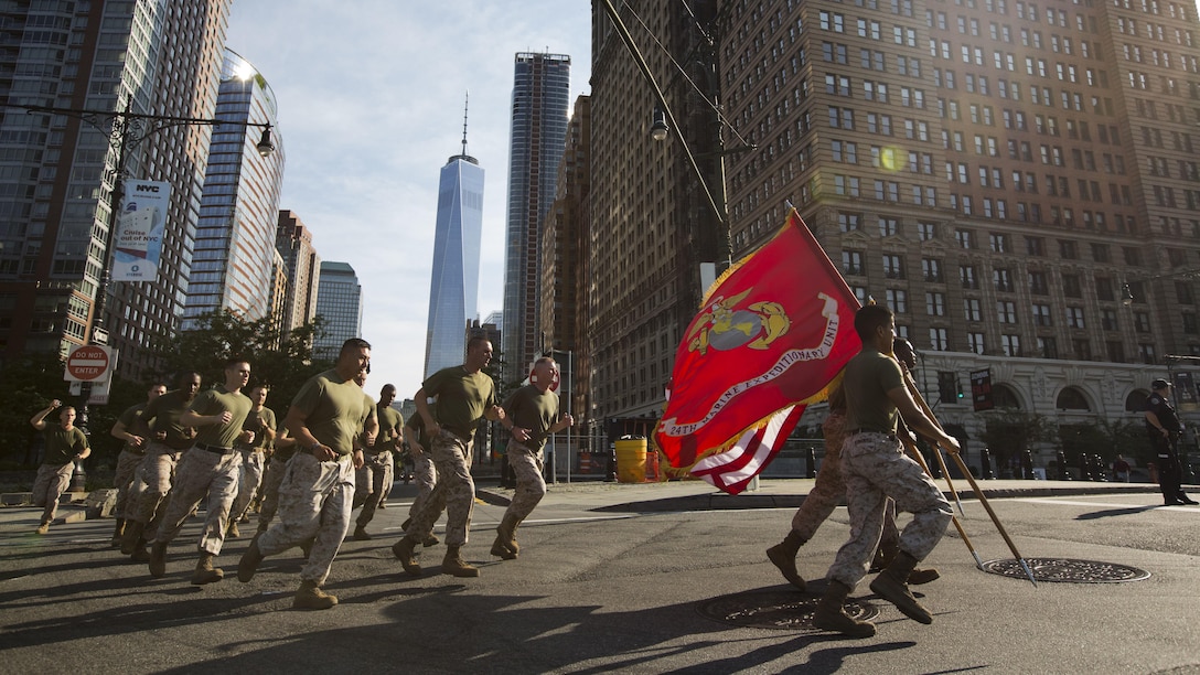 Marines with the 24th Marine Expeditionary Unit run through the city streets during the Freedom Run as part of Fleet Week in New York, May 29, 2016. Service members from U.S. Marine Corps, U.S. Navy and Candadian Navy ran from the North Cove Marina to the 9/11 Memorial to honor the fallen.