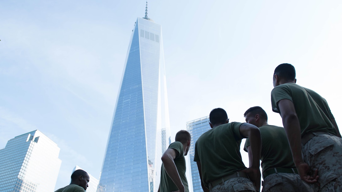 Marines with the 24th Marine Expeditionary Unit look around the 9/11 Memorial after the Freedom Run as part of Fleet Week in New York, May 29, 2016. Service members from the U.S. Marine Corps, U.S. Navy and Canadian Navy ran from the North Cove Marina to the 9/11 Memorial to honor the fallen.