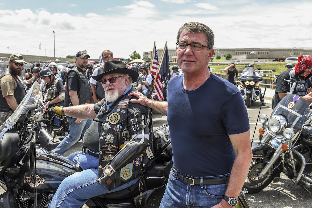 Defense Secretary Ash Carter talks with participants of the Rolling Thunder motorcycle ride at the start of the event at the Pentagon, May 29, 2016. The annual ride aims to raise awareness for prisoners of war and U.S. service members missing in action. DoD photo by Army Sgt. 1st Class Clydell Kinchen