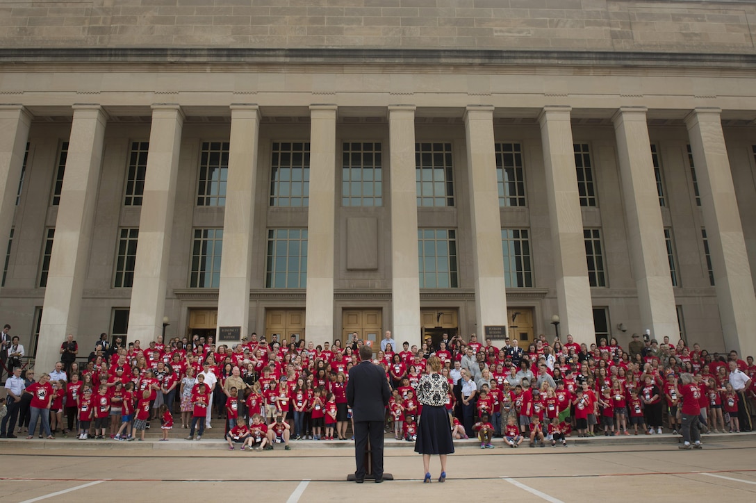 Defense Secretary Ash Carter and his wife, Stephanie, talk to more than 350 children and counselors from the Tragedy Assistance Program for Survivors, or TAPS, at the Pentagon, May 27, 2016, as part of the program's annual Military Survivor Seminar and Good Grief camp for young survivors. DoD photo by Air Force Senior Master Sgt. Adrian Cadiz