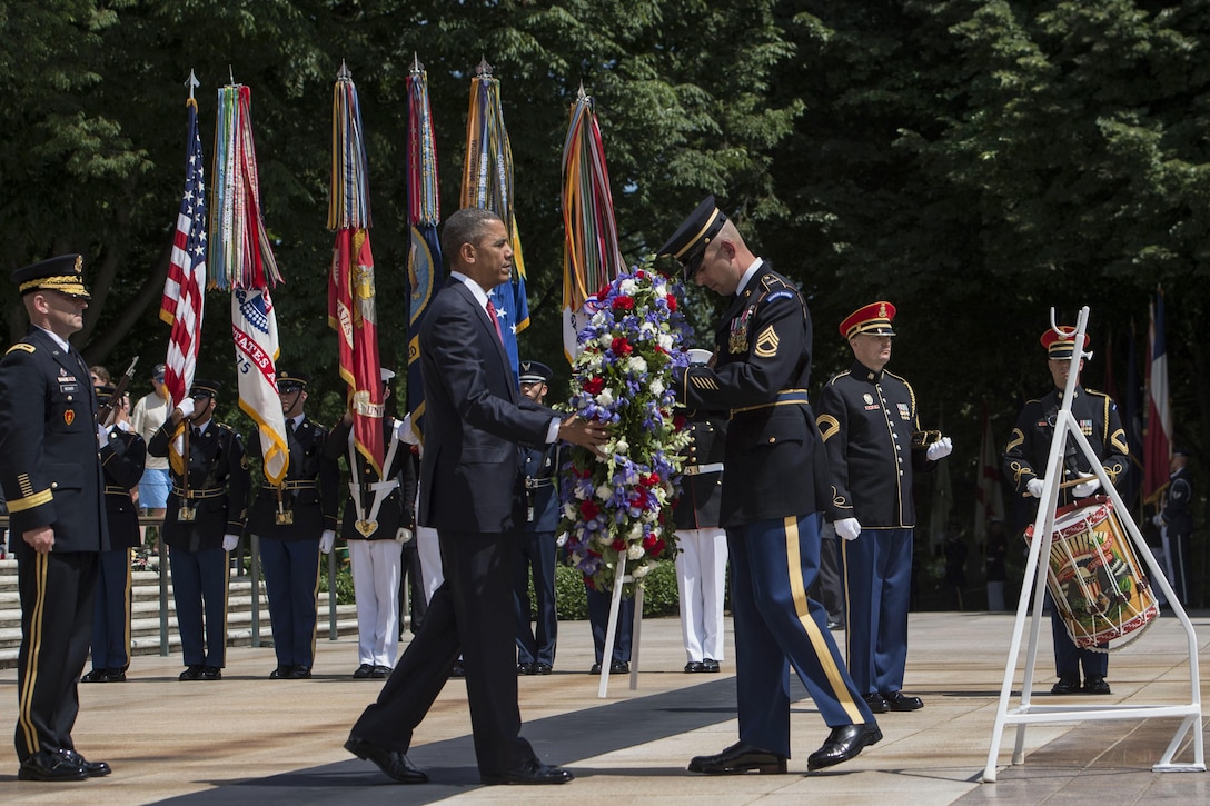 President Barack Obama places a wreath at the Tomb of the Unknown Soldier during a Memorial Day ceremony at Arlington National Cemetery in Arlington, Va., May 30, 2016. DoD photo by Air Force Senior Master Sgt. Adrian Cadiz