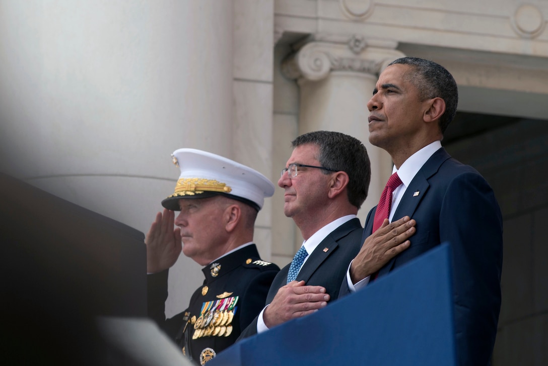 President Barack Obama, right, Defense Secretary Ash Carter and Marine Corps Gen. Joe Dunford, chairman of the Joint Chiefs of Staff, render honors during a wreath-laying ceremony to mark Memorial Day at Arlington National Cemetery in Arlington, Va., May 30, 2016. DoD photo by Air Force Senior Master Sgt. Adrian Cadiz 