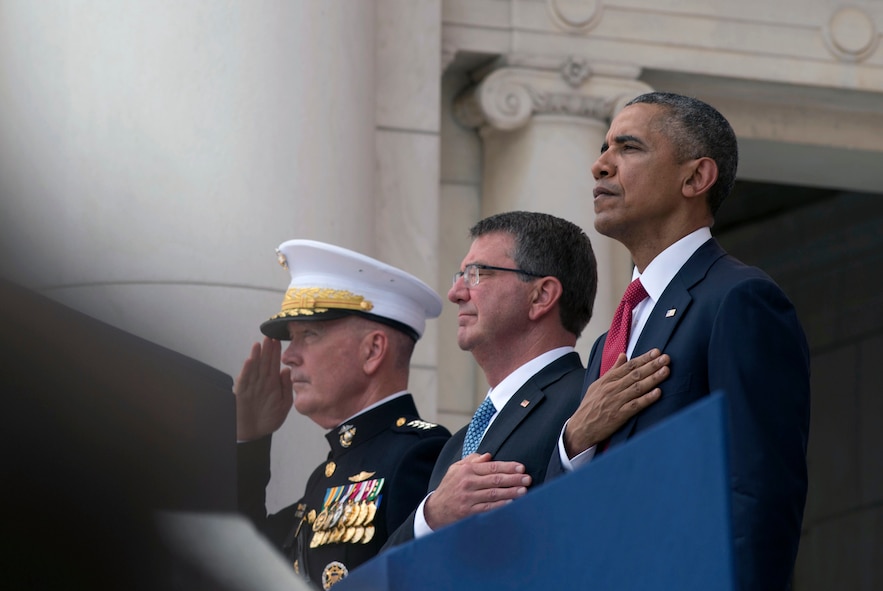 President Barack Obama, right, Defense Secretary Ash Carter and Marine Corps Gen. Joe Dunford, chairman of the Joint Chiefs of Staff, rendering honors during a wreath-laying ceremony.