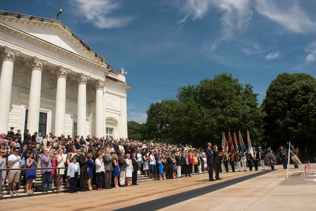 President Barack Obama, front, Defense Secretary Ash Carter and Marine Corps Gen. Joe Dunford, chairman of the Joint Chiefs of Staff, attend a wreath-laying ceremony to mark Memorial Day at Arlington National Cemetery in Arlington, Va., May 30, 2016. DoD photo by Air Force Senior Master Sgt. Adrian Cadiz