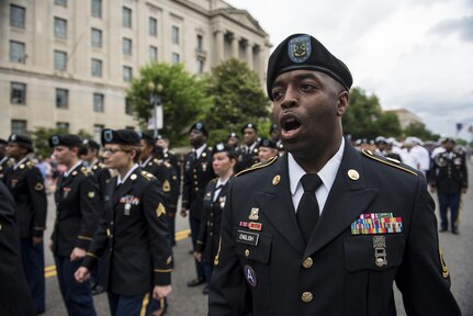 Sgt. 1st Class Ronald English, a U.S. Army Reserve Soldier with the 200th Military Police Command, leads a formation of roughly a hundred Soldiers along Constitution Avenue in the 2016 National Memorial Day Parade in Washington, D.C., May 30. U.S. Army Reserve Soldiers in formation were represented by the 200th MP Cmd., from Fort Meade, Maryland; the 55th Sustainment Brigade, from Fort Belvoir, Virginia; and the Military Intelligence Readiness Command, from Fort Belvoir. (U.S. Army photo by Master Sgt. Michel Sauret)