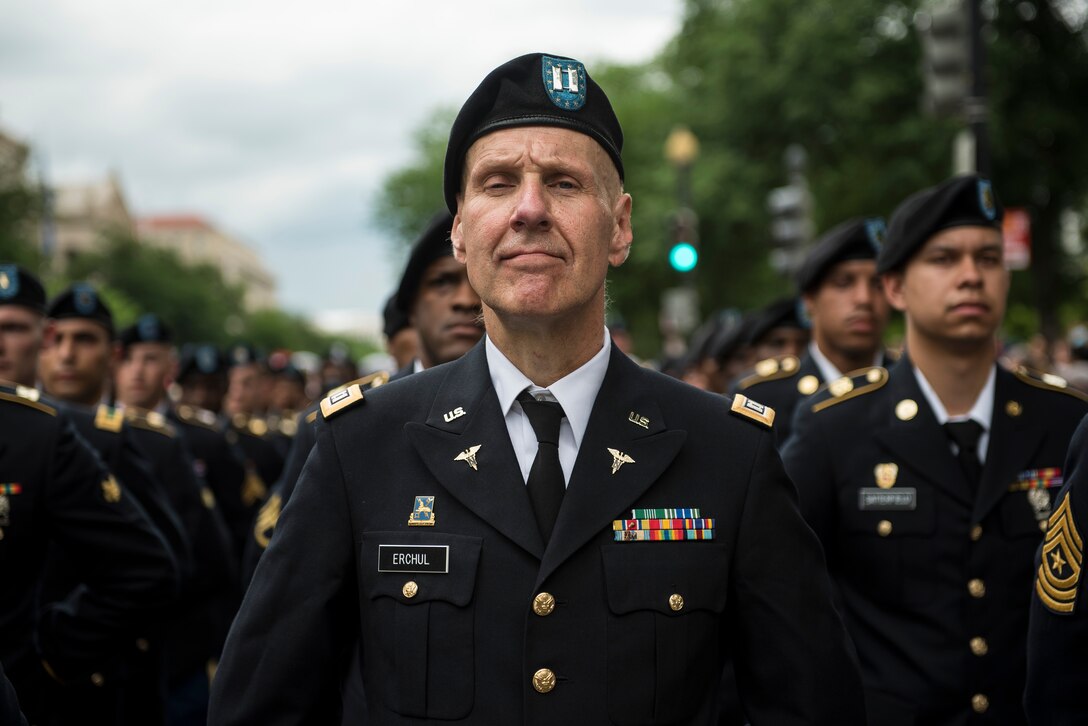 Capt. Daniel Erchul, U.S. Army Reserve Soldier, stands in formation on Constitution Avenue during the 2016 National Memorial Day Parade in Washington, D.C., May 30. Soldiers in formation were from the 200th Military Police Command, from Fort Meade, Maryland; the 55th Sustainment Brigade, from Fort Belvoir, Virginia; and the Military Intelligence Readiness Command, from Fort Belvoir. (U.S. Army photo by Master Sgt. Michel Sauret)