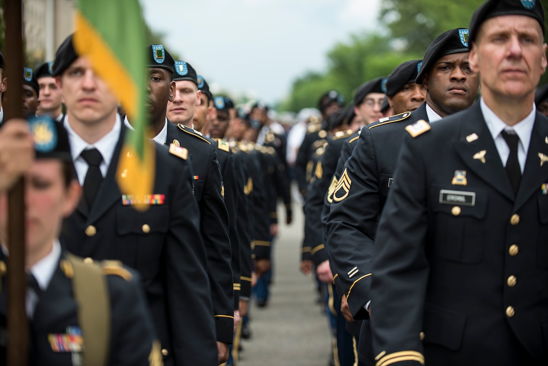 Approximately a hundred U.S. Army Reserve Soldiers march along Constitution Avenue in the 2016 National Memorial Day Parade in Washington, D.C., May 30. The Soldiers in formation were from the 200th Military Police Command, from Fort Meade, Maryland; the 55th Sustainment Brigade, from Fort Belvoir, Virginia; and the Military Intelligence Readiness Command, from Fort Belvoir. (U.S. Army photo by Master Sgt. Michel Sauret)