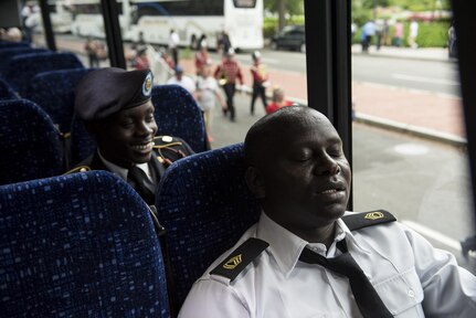 Sgt. 1st Class Ivo Degoh, U.S. Army Reserve Soldier with the 200th Military Police Command, takes a breather in an air-conditioned bus to cool off from the afternoon march along Constitution Avenue in the 2016 National Memorial Day Parade in Washington, D.C., May 30. Approximately a hundred U.S. Army Reserve Soldiers marched in the parade, represented by the 200th MP Cmd., from Fort Meade, Maryland; the 55th Sustainment Brigade, from Fort Belvoir, Virginia; and the Military Intelligence Readiness Command, from Fort Belvoir. (U.S. Army photo by Master Sgt. Michel Sauret)(U.S. Army photo by Master Sgt. Michel Sauret)