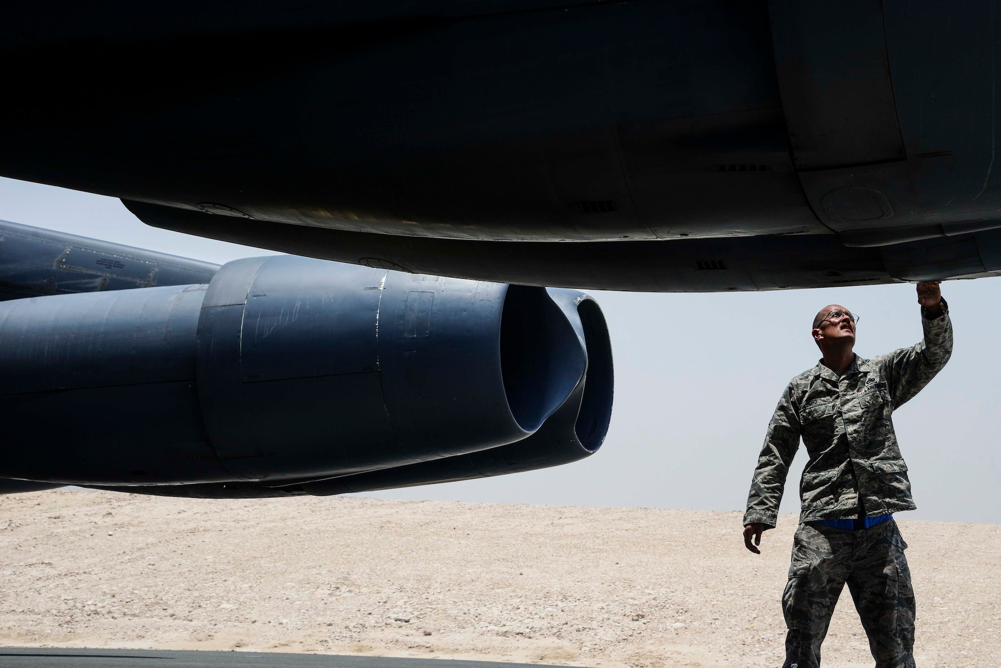 Master Sgt. Jeremy Michael Hord, 379th Aircraft Maintenance Squadron aircraft section chief, checks the screws of a B-52 Stratofortress May 20, 2016, at Al Udeid Air Base, Qatar. Hord achieved a career milestone when he launched his third type of bomber, a B-52 Stratofortress, into combat April 14 here. Now, Hord can say he has launched every type of bomber currently serving in the U.S. Air Force’s fleet. (U.S. Air Force/Senior Airman Janelle Patiño/Released)
