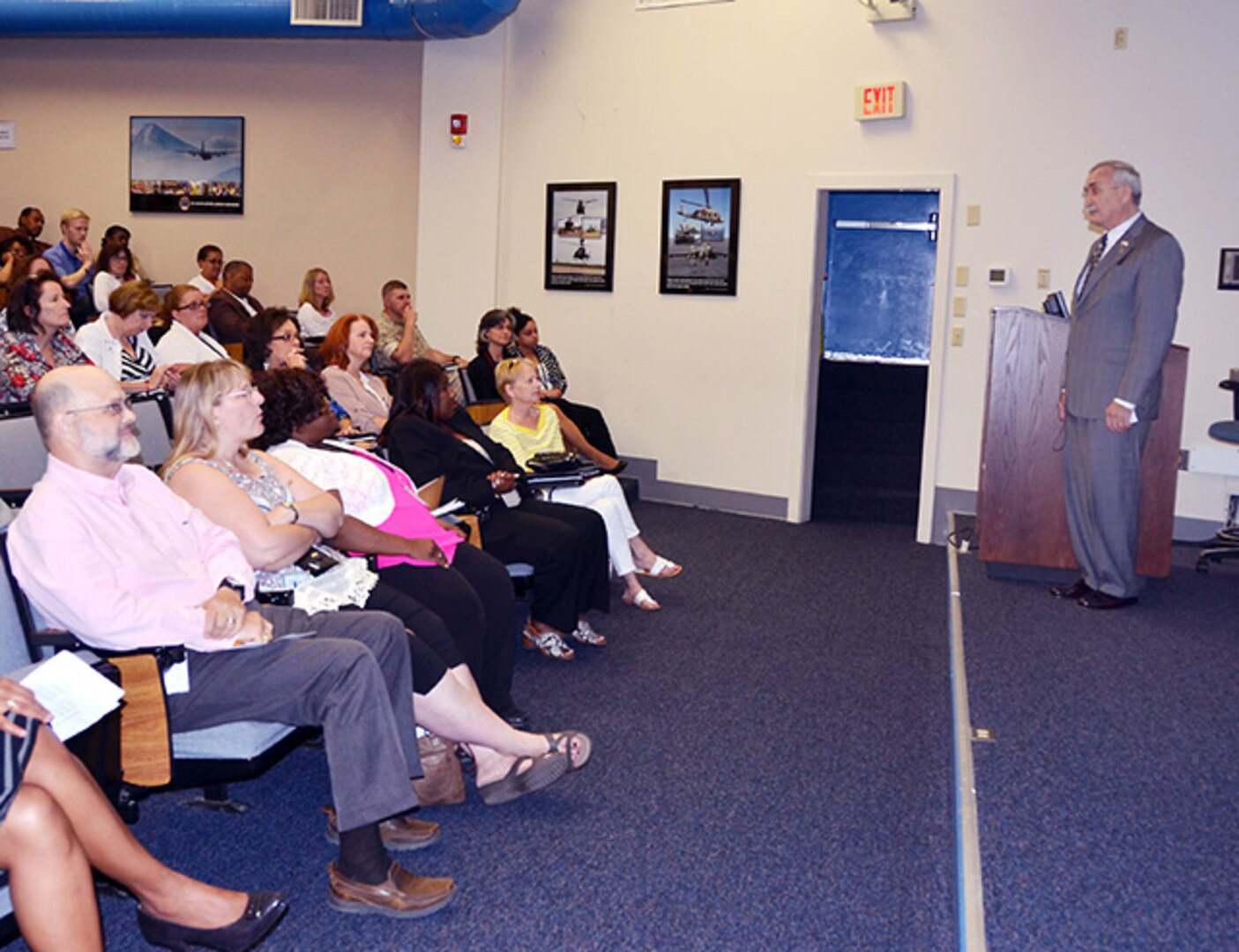 Holocaust refugee and motivational speaker Alex Keisch answers questions from the crowd during Defense Logistics Agency Aviation’s Procurement Process Support Directorate’s Holocaust Days of Remembrance 2016 program held at the McKeever Auditorium on Defense Supply Center Richmond, Virginia, May 25, 2016. 