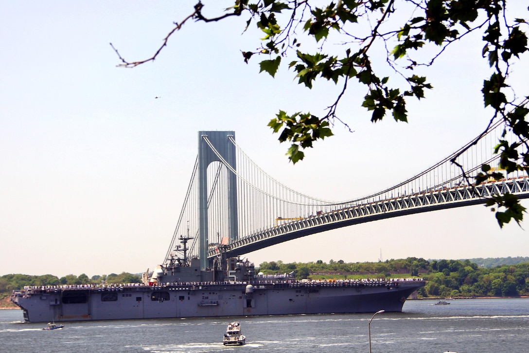 The USS Bataan approaches the Verrazano-Narrows Bridge during the parade of ships as part of Fleet Week New York in New York City, May 25, 2016. Army photo by Edward Loomis