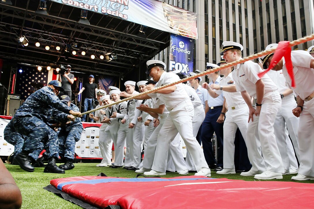 Sailors pull together to win the annual Navy and Marine Corps tug-of-war competition during Fleet Week New York in New York City, May 27, 2016. Navy Photo by Petty Officer 3rd Class Kristopher Ruiz