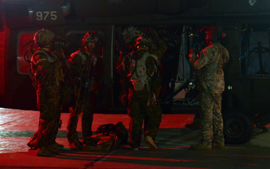 Canadian Soldiers with 3rd Battalion Princess Patricia's Canadian Light Infantry board a UH-60 helicopter operated by U.S. Soldiers from Company A, 1st Battalion, 168th Aviation Regiment at Canadian Forces Base Cold Lake, as part of Exercise Maple Resolve, May 27, 2016.  The exercise saw coalition forces working together to demonstrate their ability to not only project power across great distances, but also highlight the interoperability between Canadian and U.S. military forces.  (U.S. Army Sgt. William A. Parsons, 214th Mobile Public Affairs detachment)(Released)