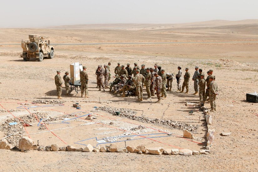 Soldiers and leaders with 2nd Armored Brigade Combat Team, 1st Infantry Division, and the Jordanian Armed Forces discuss a tactical plan during exercise Eager Lion 16 at the Joint Training Center, Jordan, May 15, 2016. Eager Lion is an annual, bilateral exercise that took place taking place in the Hashemite Kingdom of Jordan between the Jordanian Armed Forces and the U.S. Military that is designed to strengthen relationships between the partner nations.