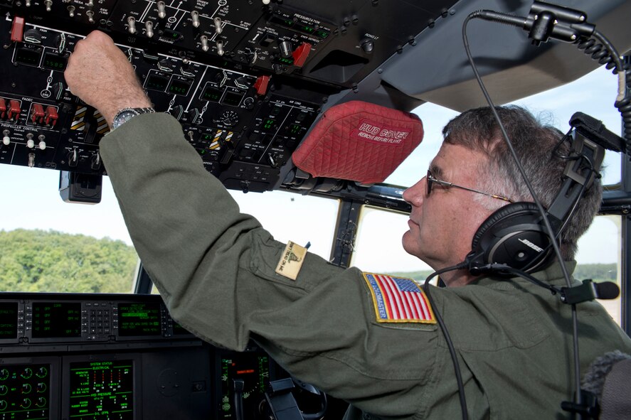 U.S. Air Force Reserve Chief Master Sgt. Steve Tarrance, a 327th Airlift Squadron loadmaster, performs an engine start up on a C-130J at Little Rock Air Force Base, Ark., May 13, 2016. Tarrance, was part of the first C-130J mission flown by an all Reserve aircrew from the 913th Airlift Group and 327 AS since the group’s transition from the “H” to the “J” model. (U.S. Air Force photo by Master Sgt. Jeff Walston/Released)