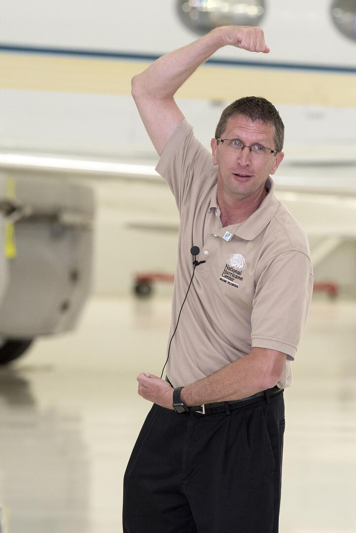 Dr. Rick Knabb, National Oceanic Atmospheric Administration’s National Hurricane Center director and 2016 Hurricane Awareness Tour keynote speaker, does the Hurricane Strong pose while giving a speech to kick of the NOAA Hurricane Awareness Tour in the Valero Hangar at the San Antonio Airport May 16, 2016. Knabb said the pose, which mimics the shape of a hurricane, was created as a fun way to get people excited about preparing for hurricane season.