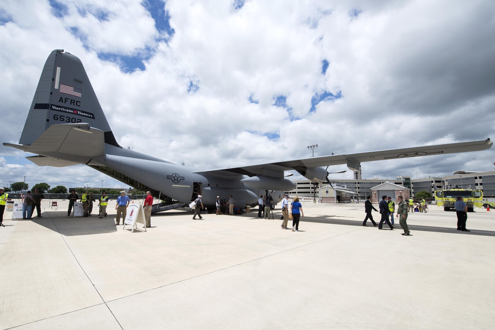 Members of media and the public tour a WC-130J Hercules from the 53rd Weather Reconnaissance Squadron at Keesler Air Force Base, Miss., during the Hurricane Awareness Tour at the San Antonio International Airport May 16, 2016. The aircraft, one of 10 at the 53rd WRS, is used to fly directly into hurricanes to collect weather data such as wind speed, temperature, humidity and air pressure.