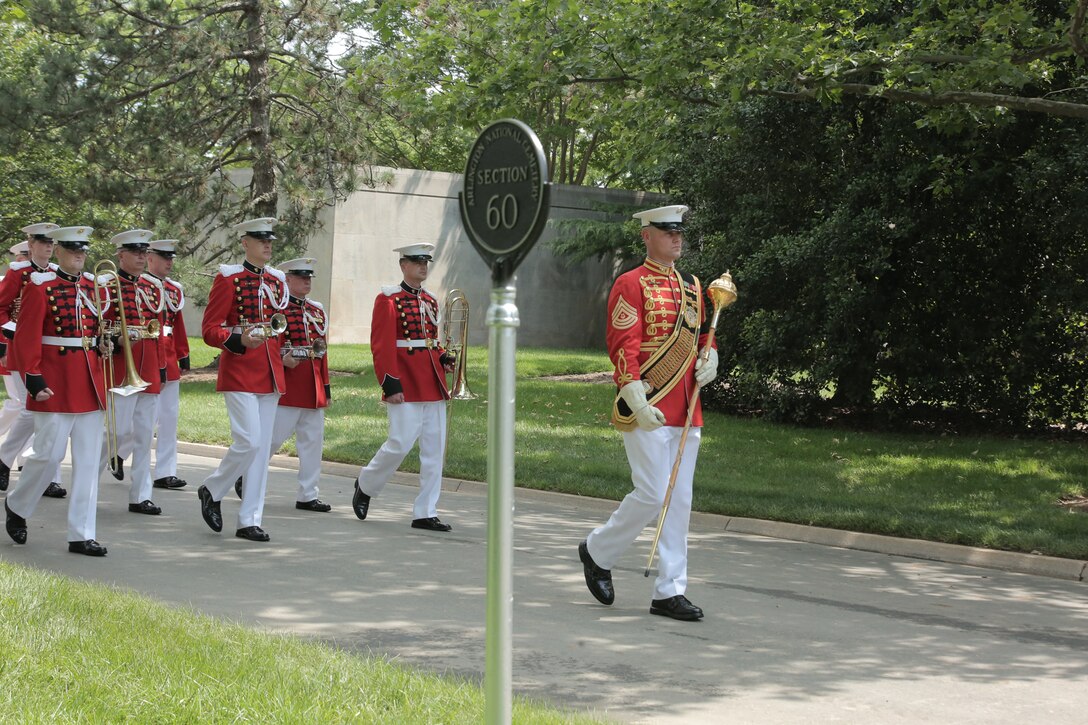 On May 31, 2016, the Marine Band, led by Drum Major Master Sgt. Duane King, participated in the funeral for World War II casualty Pfc. James Johnson, USMC. Pfc. Johnson was killed in action on Nov. 20, 1943 during the Battle of Tarawa in the central Pacific Ocean. In June 2015 History Flight, a private organization, excavated what was believed to be a wartime fighting position on the island of Betio. During this excavation History Flight recovered 35 sets of remains. The Joint POW/MIA Accounting Command used used Y-Short Tandem Repeat DNA analysis, which matched a nephew; laboratory analysis, including dental analysis, chest radiograph comparison, and anthropological comparison, which matched Johnson’s records; as well as circumstantial and material evidence to identify Pfc. Johnson. His remains were returned to the United States and buried at Arlington National Cemetery's Section 60 with military honors. (U.S. Marine Corps photo by Master Sgt. Kristin duBois/released)