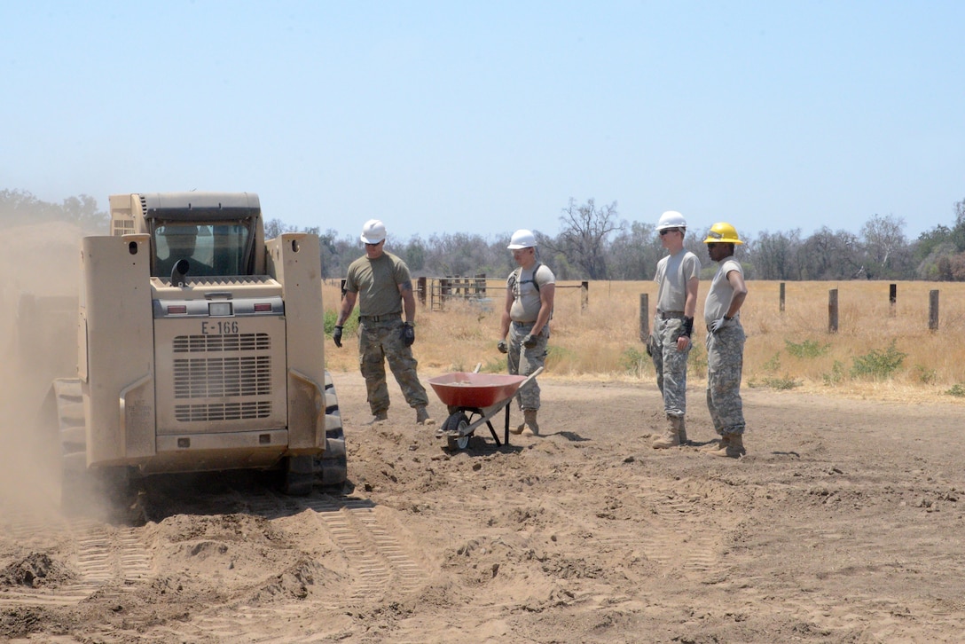 Soldiers train on the skit-steer loader in the Kaweah Oaks Preserve at Exeter, California, Monday, May 24, 2016. (U.S. Army Photo by Sgt. Alfonso Corral from the 318th Press Camp Headquarters)