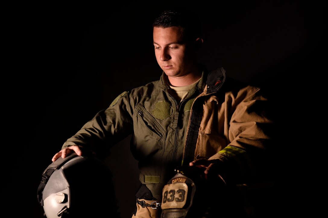 Staff Sgt. Garrett Christensen, 56th Civil Engineer Squadron logistics NCO in charge, prepares for his transition from firefighter to fighter pilot April 14, 2016 at Luke Air Force Base, Ariz. Christensen has been selected for Basic Officer Training School with the ultimate goal of becoming a fighter pilot. (U.S Air Force photo by Staff Sgt. Staci Miller)