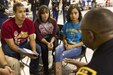 Maj. Gen. Phillip M. Churn talks to a group of students at a high school award ceremony that was held at the 83rd Military Police Company in El Paso, Texas on May 21, 2016 to recognize over 80 high school seniors for their decision to join the Army after graduation. (U.S. Army photo by Spc. Stephanie Ramirez)  