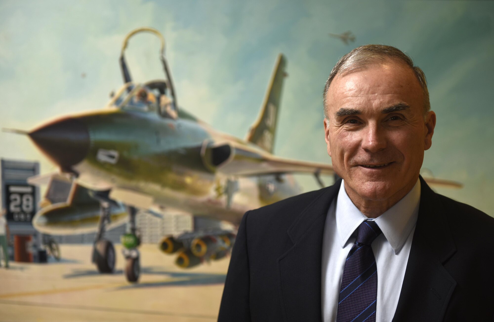 Donald Allen, a senior analyst and Vietnam veteran, served as an AT-28 Trojan pilot assigned to the 56th Special Operations Wing, said he was excited about the art exhibit opening of the 50th commemoration of the Vietnam War in the Air Force Art Gallery located in the Pentagon, Washington, D.C., May 26, 2016. (U.S. Air Force photo/Tech. Sgt. Joshua L. DeMotts)
