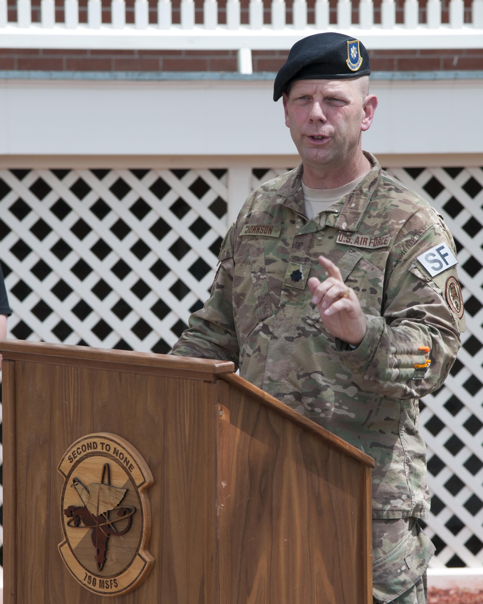 Lt. Col. Christopher Johnson, 790th Missile Security Forces Squadron commander, speaks at a rededication ceremony for a memorial to fallen defenders on F.E. Warren Air Force Base, Wyo., May 30, 2016. Johnson spoke of the sacrifice of the defenders whose names are on the memorial and the importance of remembering what they did for their country.  (U.S. Air Force photo by Senior Airman Jason Wiese)