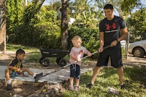 U.S. Marine Lance Cpl. Simon Delacruz helps an Australian preschooler rake a garden at Millner Preschool, Northern Territory, Australia, on May 28, 2016. U.S. Marines with Forward Coordination Element, Marine Rotational Force – Darwin, volunteered with preschool teachers and parents to clean up the schoolyard for preschoolers. MRF-D is a six-month deployment of Marines into Darwin, Australia, where they will contribute to and engage with local communities. Delacruz, from Rochester, New York, is a cyber network operator with FCE, MRF-D.