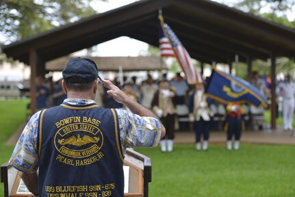 160530-N-LY160-735 
JOINT BASE PEARL HARBOR-HICKAM, Hawaii (May 30, 2016) – Retired Lt. Cmdr. Paul T. Jurcsak, base commander of the U.S. Submarine Veterans Bowfin Base, salutes the national ensign during the Memorial Day ceremony at the USS Parche Submarine Park and Memorial at Joint Base Pearl Harbor-Hickam. The service honored past submariners and paid tribute to the 65 U.S. submarines lost since 1915, with 52 lost during World War II alone. (U.S. Navy photo by Mass Communication Specialist 2nd Class Michael H. Lee)