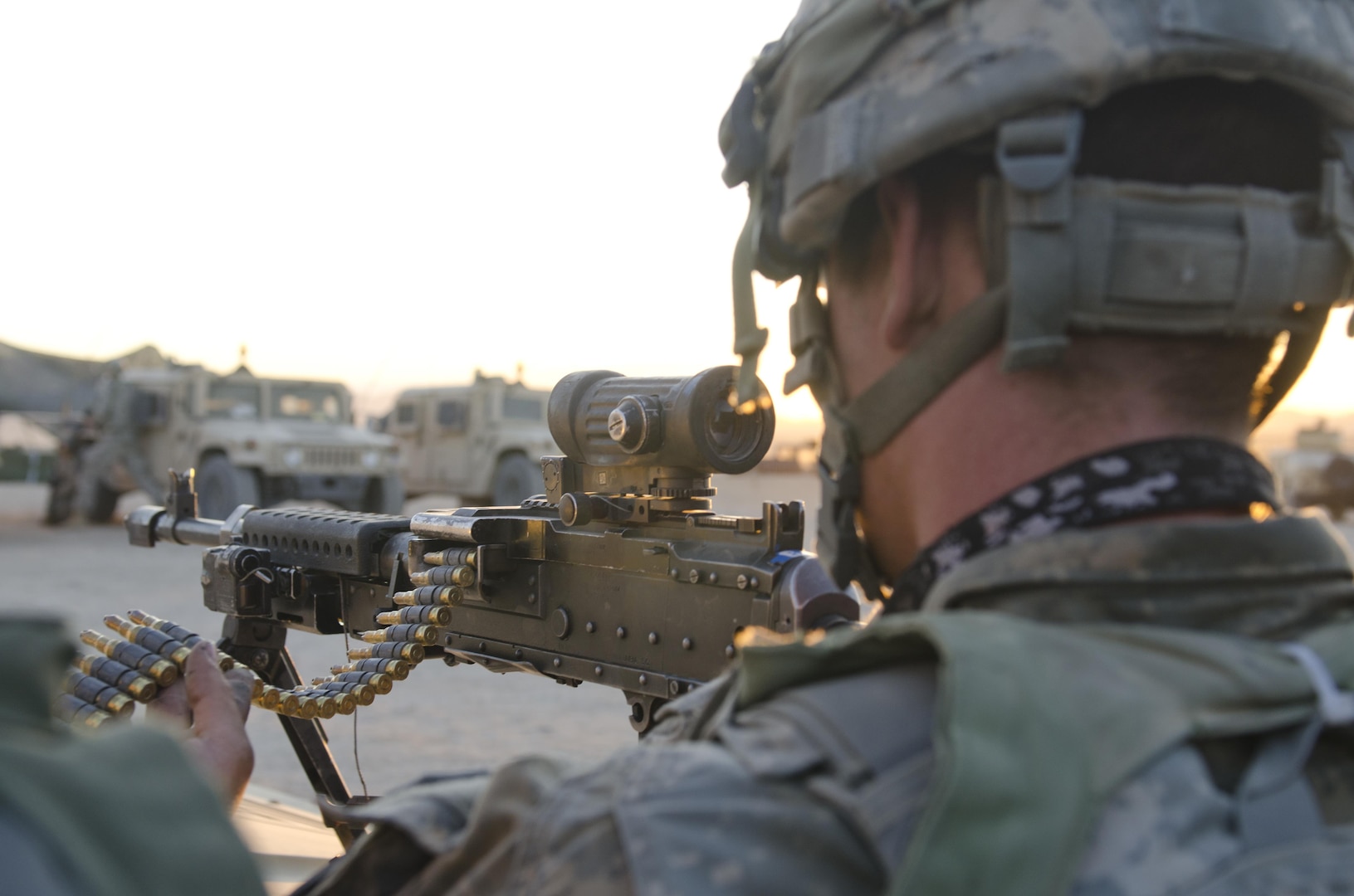 A Soldier assigned to 1-2 Stryker Brigade Combat Team prepares to fire back at enemy soldiers during Decisive Action Training Rotation 16-06 at the National Training Center in Fort Irwin, Calif., May 16, 2016. The training focused on the 1-2 SBCT combating a near-peer enemy and smaller militant groups in a foreign country. (U.S. Army Photo by Maj. Kelly Haux)
