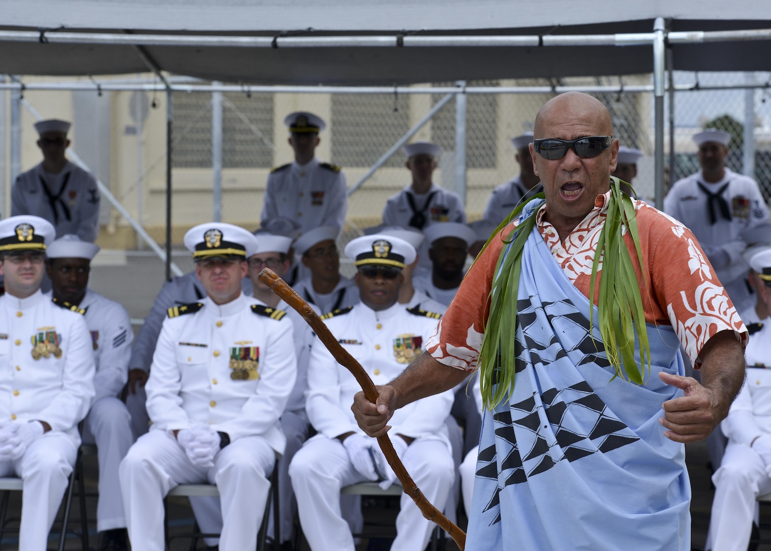 160530-N-LY160-489 JOINT BASE PEARL HARBOR-HICKAM, Hawaii (May 30, 2016) Tom Stone performs a Pula Aloha, a traditional Hawaiian blessing, during a Memorial Day decommissioning ceremony of the Los Angeles-class fast-attack submarine USS City of Corpus Christi (SSN 705) at Joint Base Pearl Harbor-Hickam. City of Corpus Christi concluded 33 years of service as the second U.S. warship to be named after Corpus Christi, Texas. (U.S. Navy photo by Mass Communication Specialist 2nd Class Michael H. Lee)