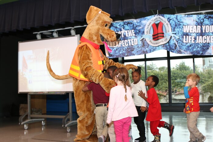 Bobber, U.S. Army Corps of Engineers national water safety mascot, interacts with the Memminger elementary school students in May 2016. Bobber promotes children's water safety by reminding the youngsters to always wear their life jackets when they are near or in the water. Memminger elementary school is located in downtown Charleston, S.C. (USACE courtesy photo)