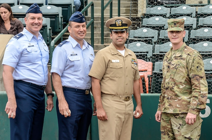 Joint Base Charleston leadership were invited onto the field to throw ceremonial first pitches during Military Appreciation Night, May 19, 2016 at Joseph P. Riley Jr. ballpark in Charleston, S.C. The Charleston RiverDogs hosted Military Appreciation Night to show their support for the local military. (U.S. Air Force photo/ Airman 1st Class Haleigh Laverty)
