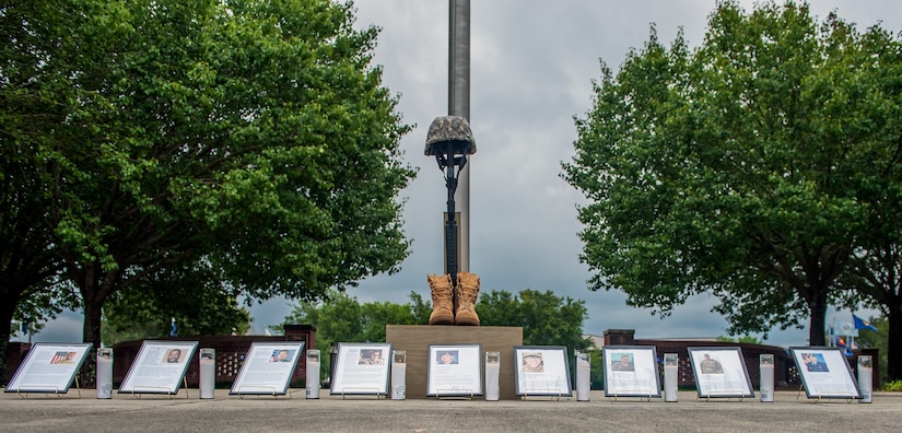 A memorial honoring fallen security service members is displayed during Police Week at Joint Base Charleston, S.C. May 18, 2016. A 24-hour silent vigil was held for nine law enforcement Airmen who made the ultimate sacrifice. (U.S. Air Force photo/Staff Sgt. Jared Trimarchi) 