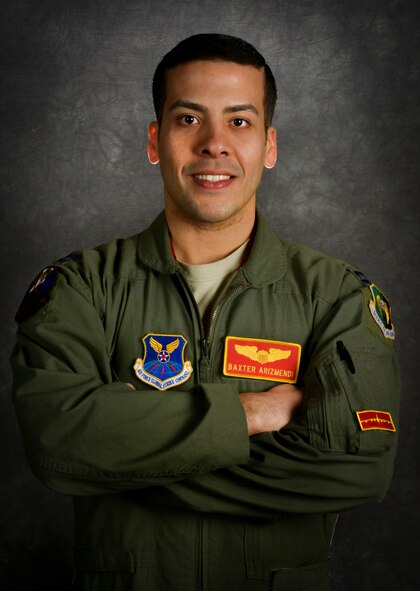 Capt. Julio “Baxter” Arizmendi, 23rd Bomb Squadron pilot, poses for a photo at Minot Air Force Base, N.D.,  Jan. 26, 2016. Arizmendi is a member of the Language Enabled Airman Program which allows Airmen with bi-lingual capabilities to enhance their second language and practice using it to assist with U.S. Air Force missions. (U.S. Air Force photo/Senior Airman Sahara L. Fales)