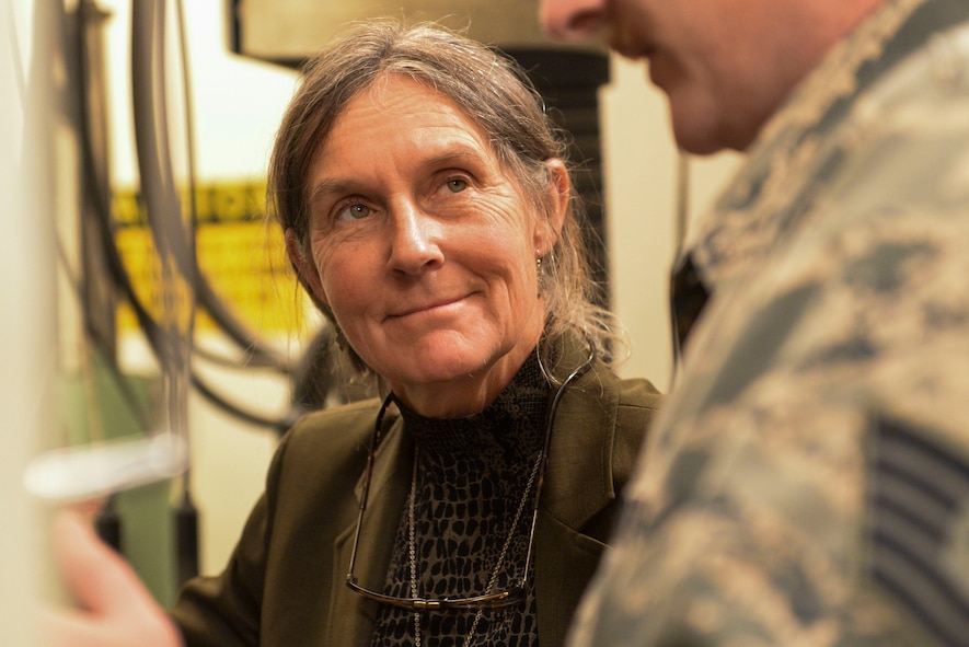 Retired Brig. Gen. Rhonda Cornum, a former U.S. Army flight surgeon, talks with an Airman from the 791st Maintenance Squadron from Minot Air Force Base, N.D., May 24, 2016. During her visit, Cornum visited with 91st Missile Wing and 5th Bomb Wing Airmen to give a speech on comprehensive fitness and her experience as a prisoner of war during the Persian Gulf War. (U.S. Air Force Photo/Airman 1st Class Jessica Weissman)