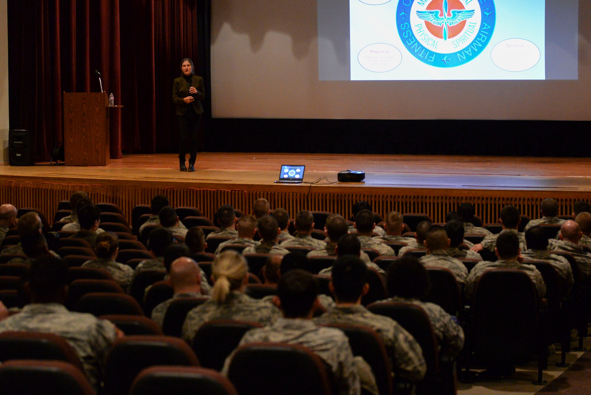 Retired Brig. Gen. Rhonda Cornum, a former U.S. Army flight surgeon, briefs members of Team Minot about comprehensive fitness at Minot Air Force Base, N.D., May 24, 2016. During her visit, Cornum experienced a B-52 flight simulator and visited with 791st Maintenance Squadron Airmen. (U.S. Air Force Photo/Airman 1st Class Jessica Weissman)